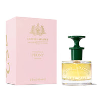 A Caswell Massey Peony Perfume 60ml bottle next to its pink box displaying the brand and floral type. The bottle has a clear square base with yellow perfume and a green cap.
