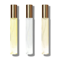 Three slim, elegant Caswell Massey Bouquet Discovery Set perfume bottles labeled "peony," "orchid," and "rose," displayed in a row on a white background, each filled with distinctly colored liquid.