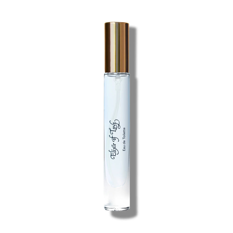 A single rollerball Caswell Massey Elixir of Love Eau de Toilette bottle with a transparent design and gold cap, labeled "Elixir of Love" in cursive script on a plain white background.