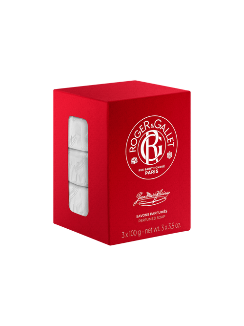 A red Roger & Gallet Jean Marie Farina soap box with a clear window showing three bars of perfumed soaps inside. The box features white text and branding details, emphasizing its Parisian origin.