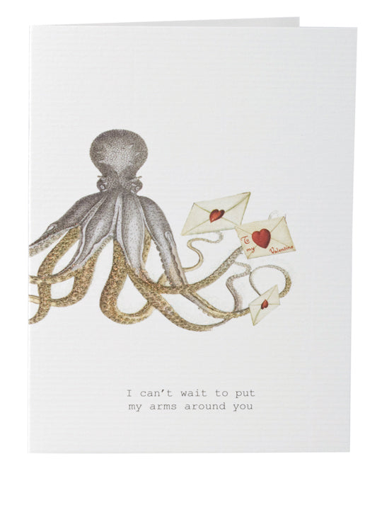 Margot Elena's TokyoMilk Greeting Card - Can't Wait To Put My Arms Around You featuring a printed octopus with extended tentacles holding two heart-stamped envelopes; text below says "I can't wait to put my arms around you," and includes hand-glittered