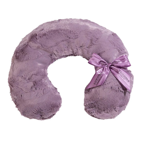 A Sonoma Lavender Elderberry Neck Pillow with lavender aromatherapy and a silky ribbon tied in a bow on the side, isolated on a white background.