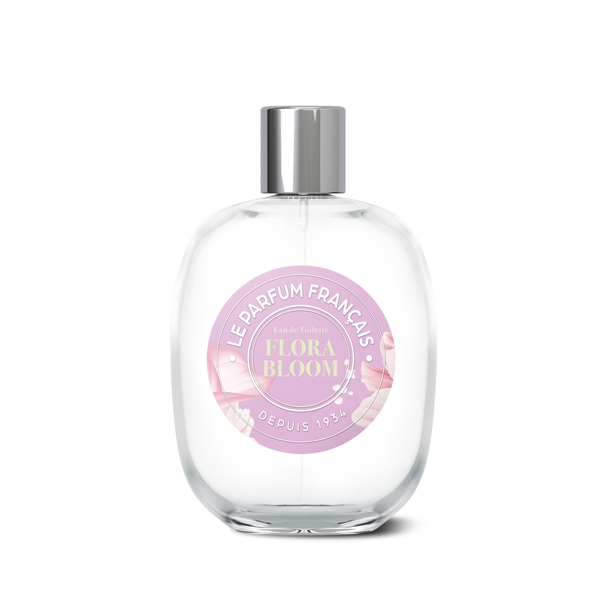 A clear perfume bottle with a pink and silver label that reads "Le Parfum Français Flora Bloom Eau de Toilette, depuis 1923" exudes timeless charm. The bottle is produced by Le Parfum Français.