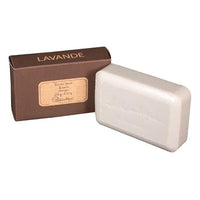 A bar of Lothantique Lavender Shea Enriched Soap next to its brown packaging box labeled "LAVANDE" with detailed text in French.