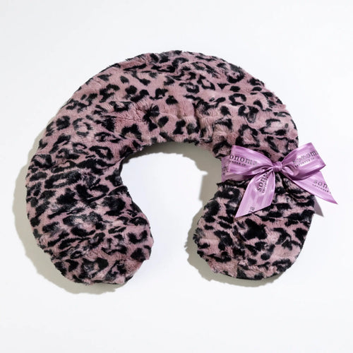 A Sonoma Lavender Jaguar Neck Pillow with a purple ribbon attached to it, lying on a white background.