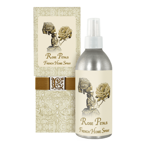 Product packaging and bottle of La Bouquetiere Rose Petal French Home Spray labeled "Bulgarian Rose Absolute," featuring elegant floral and skeletal artwork in a vintage style, displayed with a box with a similar design.