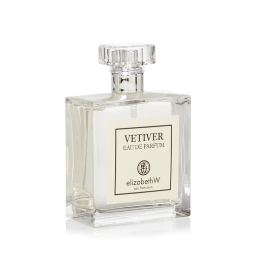A clear glass perfume bottle labeled "elizabeth W Signature Vetiver Eau de Parfum by Elizabeth W San Francisco" with a square design and a faceted cap.