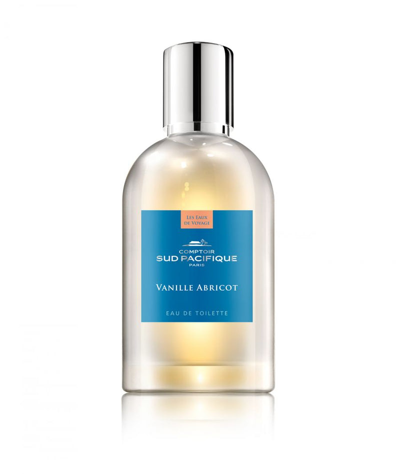 A bottle of "Comptoir Sud Pacifique Paris Vanille Abricot" eau de toilette infused with Tahitian vanilla. The bottle is clear and contains a golden yellow liquid with a blue label.