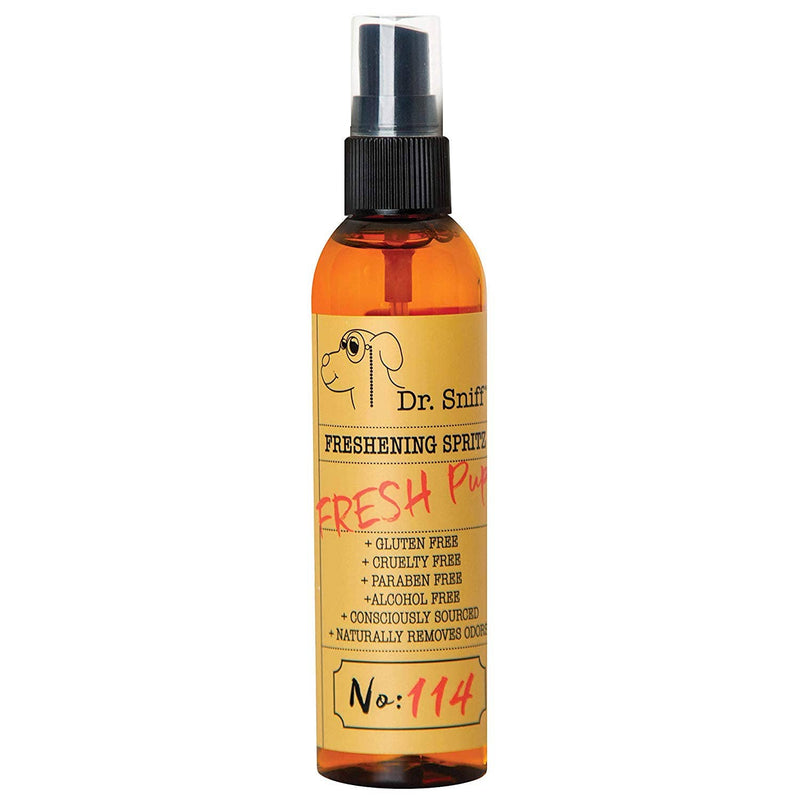 A bottle of Dr. Sniff Fresh Pup Freshening Spritz in a clear spray bottle, labeled for odor elimination with natural ingredients, featuring a cartoon dog on the label.