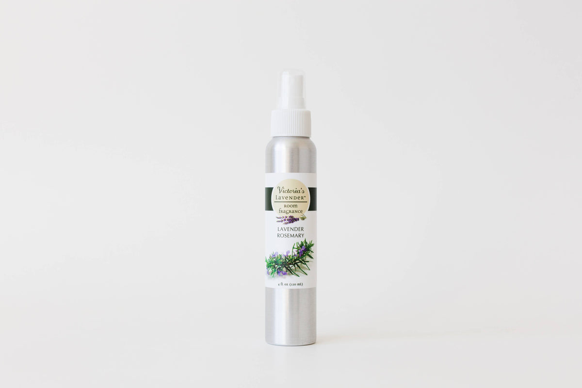 A silver spray bottle with a label that reads "Victoria's Lavender - Lavender Rosemary Home Fragrance 4 oz" against a plain white background. The label features an image of lavender and rosemary and mentions its Victoria's Lavender.