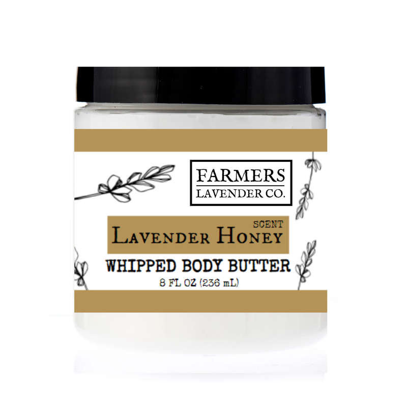 A transparent jar of FARMERS Lavender Co. - Honey Lavender Whipped Body Butter labeled "FARMERS Lavender Co. lavender honey scent," holding 8 fl oz (236 ml), against a white background.