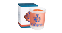 A Carthusia Corallium Candle with an orange wax and a blue crest printed on it, next to its white and blue packaging box with matching design elements.