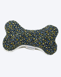 A MODERNBEAST Lavender Zenbone - Midnight Floral dog toy with a floral print in blue, yellow, and lavender on a white background, featuring a tag with the brand name "Modernbeast.