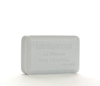 A single bar of gray Lothantique Lavender Shea Enriched Soap, centered on a plain white background.