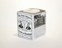 A vintage Penn Chemists Classic Candle - Cut & Shave box, featuring black and white images of a barber shop, a delivery cart, and advertisements for drugs and remedies.
