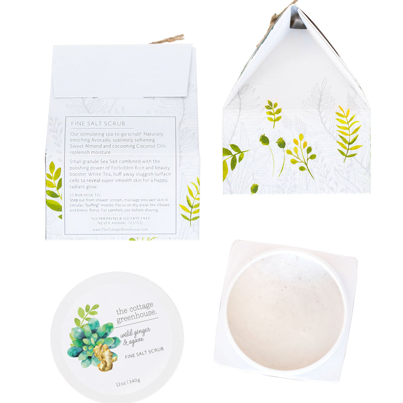 A collage of a boxed The Cottage Greenhouse Wild Ginger & Agave Fine Salt Scrub with botanical packaging. top right: leaf designs on a triangular flap. bottom left: label showing product content and blue flowers. bottom right: open jar with Margot Elena logo.