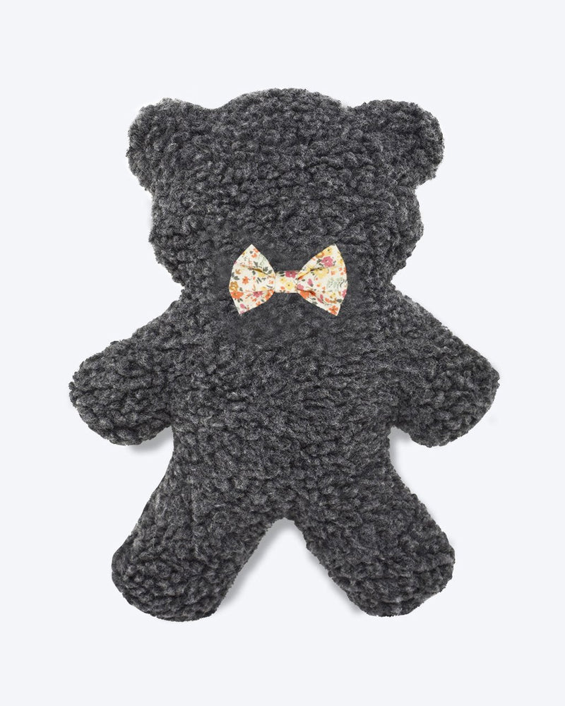A MODERNBEAST Lavender Bedtime Bear - Grey Plush with Wildflower Bowtie, isolated on a white background, perfect as a travel-friendly toy.