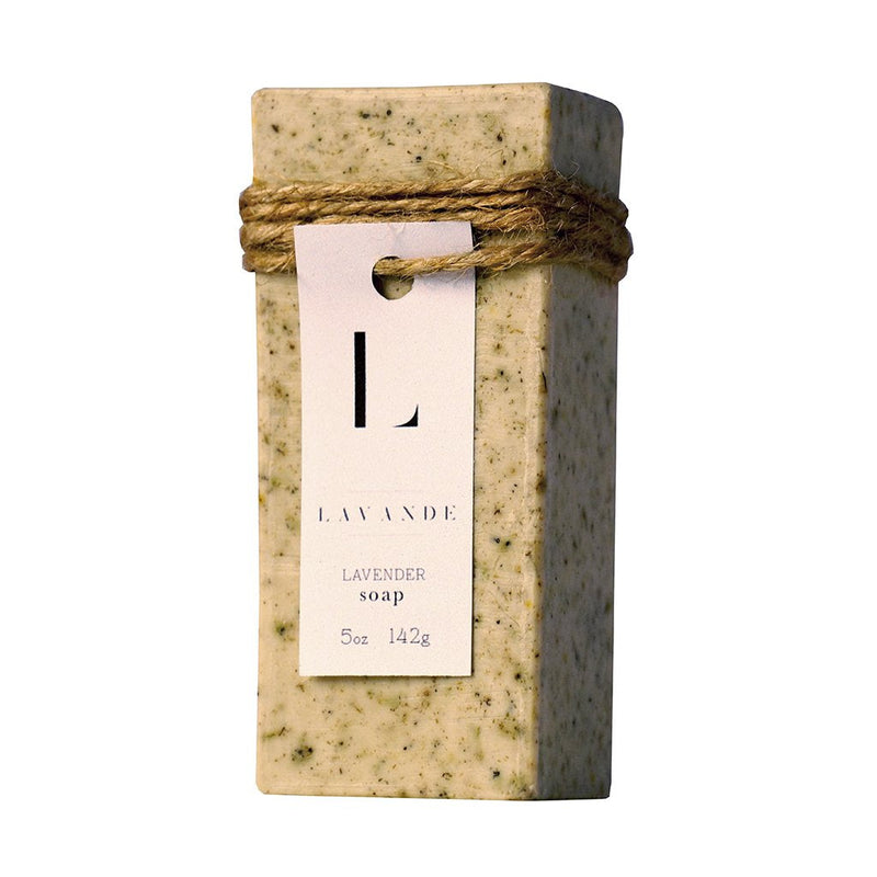 A bar of Lavande - Lavender Oatmeal Soap 5oz with a speckled texture, tied with natural twine and a white rectangular label that reads "lavande lavender soap, 5oz, 142g".