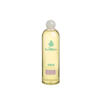 A tall, elegant glass bottle of Carthusia Fiori di Capri Reed Diffuser & Refill 500ml with a clear yellow liquid, labeled in green and gold, capped with a white spherical top, isolated on a white background.