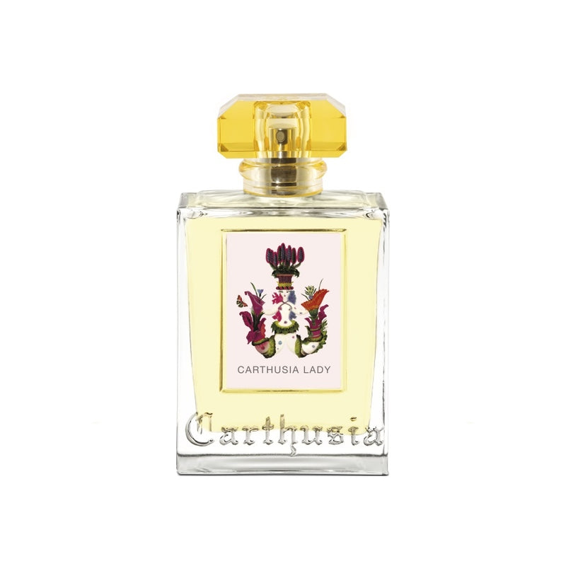 A transparent glass Carthusia Lady Eau de Parfum - 100ml perfume bottle labeled "Carthusia Lady" with a detailed floral design on the label and a faceted golden cap, showcasing a floral chypre fragrance, isolated on a white background from Carthusia I Profumi de Capri.