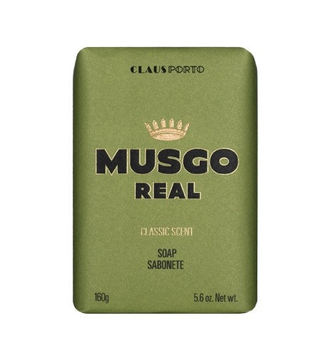 A bar of Claus Porto 1887 Musgo Real Classic Scent Single Bar Soap in olive green packaging with gold text and a crown emblem, infused with walnut extract. Weight noted as 160g.