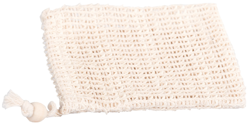 A beige textured exfoliating bath sponge folded neatly with a La Savonnerie de Nyons Cotton Soap Pocket on its left, against a white background with a soft shadow underneath.