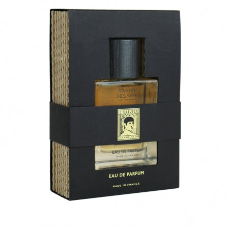 A bottle of Panier des Sens L’Olivier Eau de Parfum from Panier Des Sens, featuring packaging that incorporates natural design elements, including a straw-like material and a simple black band labelled with the brand.