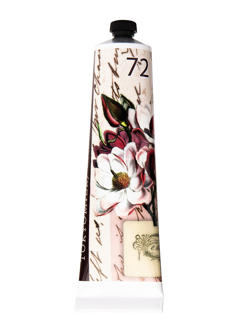 An elegantly designed TokyoMilk Make Me Blush No. 72 Bon Bon tube with floral prints and cursive text, likely containing a cosmetic product like hand cream or lotion infused with Shea Butter. The number "72" is prominently displayed at the top.