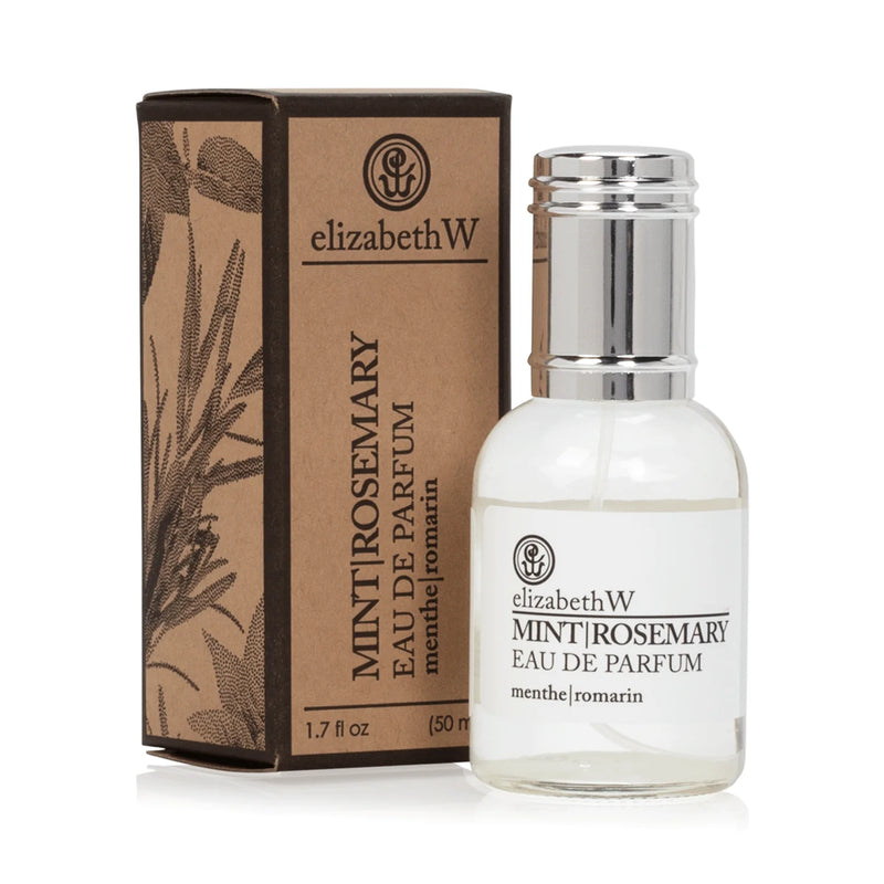 Sentence with replaced product:

elizabeth W Purely Essential Mint Rosemary Eau de Parfum in a clear glass bottle next to its brown packaging box adorned with botanical illustrations.