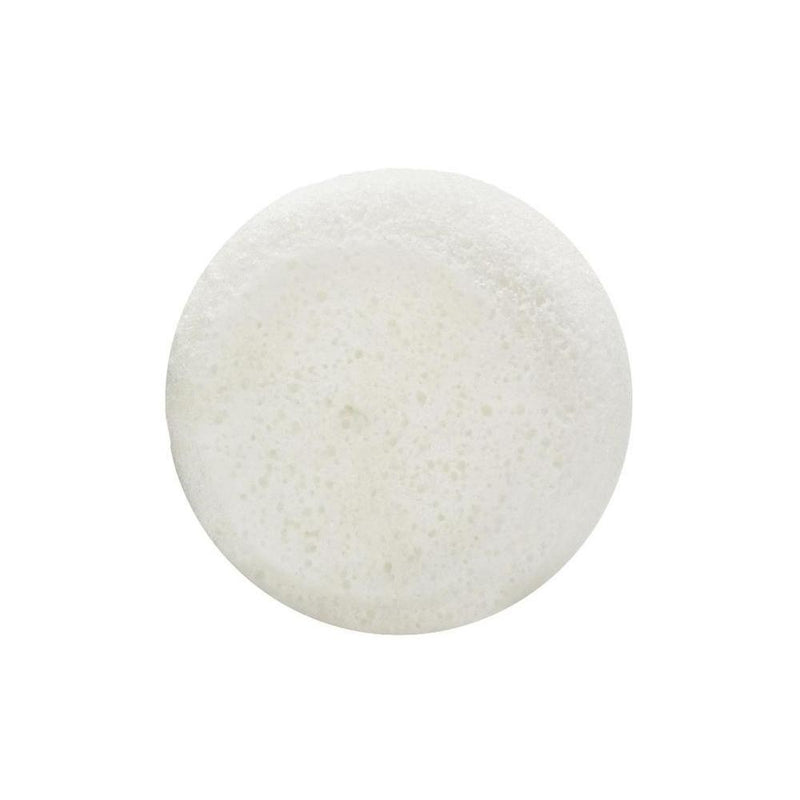 A single round effervescent tablet, white in color with a speckled surface, isolated on a white background, infused with the scent of Spongellé Men's 12+ Supreme Buffer Cedar Absolute.
