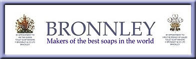 Banner with the text "Bronnley: Makers of the best soaps in the world" in blue and gray lettering, flanked by royal crests, and referencing royal warrants.