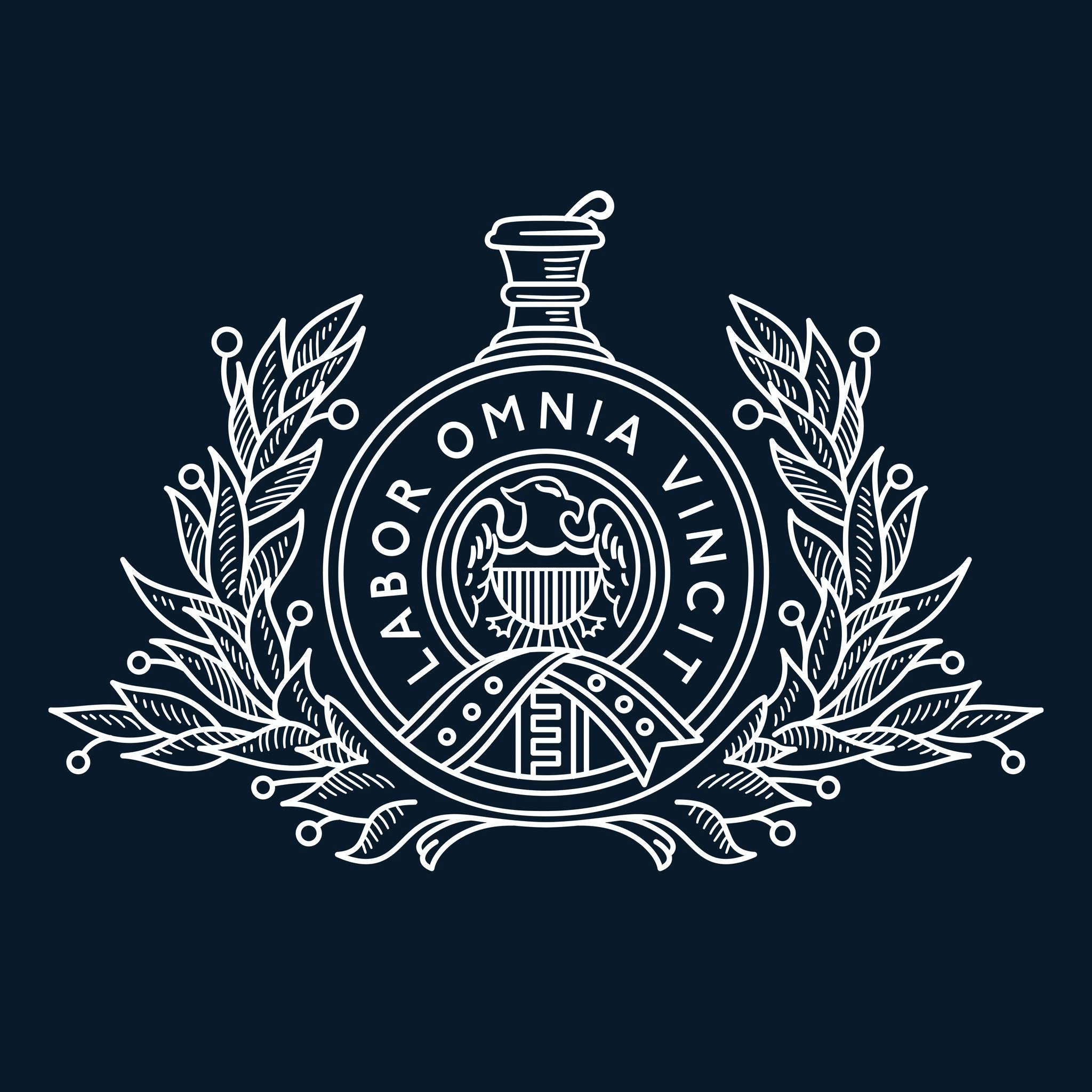 A decorative emblem featuring a central circular design with the text "Labor Omnia Vincit" and a stylized eagle. The emblem is adorned with symmetrical laurel branches on a dark background.
