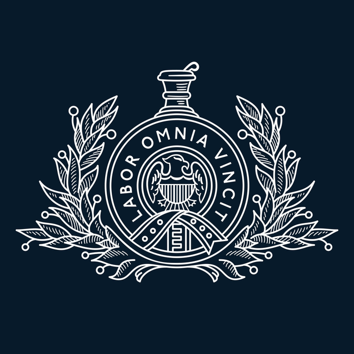 A decorative emblem featuring a central circular design with the text "Labor Omnia Vincit" and a stylized eagle. The emblem is adorned with symmetrical laurel branches on a dark background.