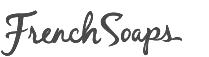 The image shows the words "French Soaps" in a cursive font with a light green outline of a butterfly on the right.