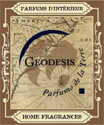 Vintage-style label with a map background, featuring "GEODESIS" and "Parfums de la Terre" in elegant font. It includes "Parfums d'intérieur" and "Home Fragrances" on ornate borders.