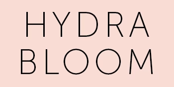 The image shows the words "HYDRA BLOOM" in black, bold, capitalized letters on a light pink background.