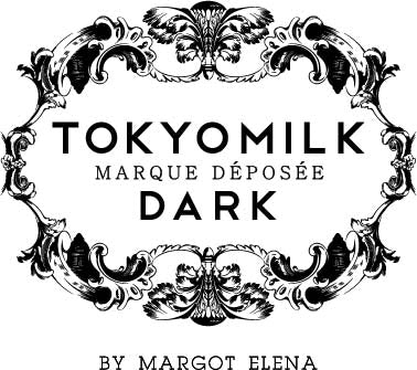 Ornate black and white label with decorative floral designs, featuring the text "TokyoMilk Marque Déposée Dark" and "By Margot Elena.