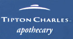 Blue background with white text that reads "Tipton Charles apothecary." The text is in an elegant font, with a subtle arc design above it.