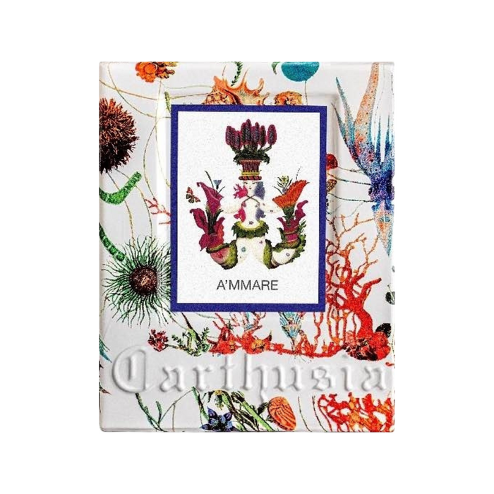 Colorful perfume packaging with a botanical theme, featuring various sea plants and corals. Central artwork enclosed in blue border. "A'MMARE" and "Carthusia" text visible. Predominantly white background.