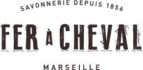 Black text logo displaying "Savonnerie Depuis 1856" above "Fer à Cheval" and "Marseille" below.