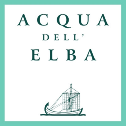 Logo of Acqua dell'Elba with teal text on a white background. A stylized ship with sails is depicted below the text. The logo is framed by a teal border.