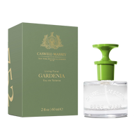 A green box labeled "Caswell Massey Gardenia Eau de Toilette - 60ml" stands beside a clear perfume bottle with a green cap and white spray nozzle, showcasing this elegant floral fragrance by Caswell Massey.