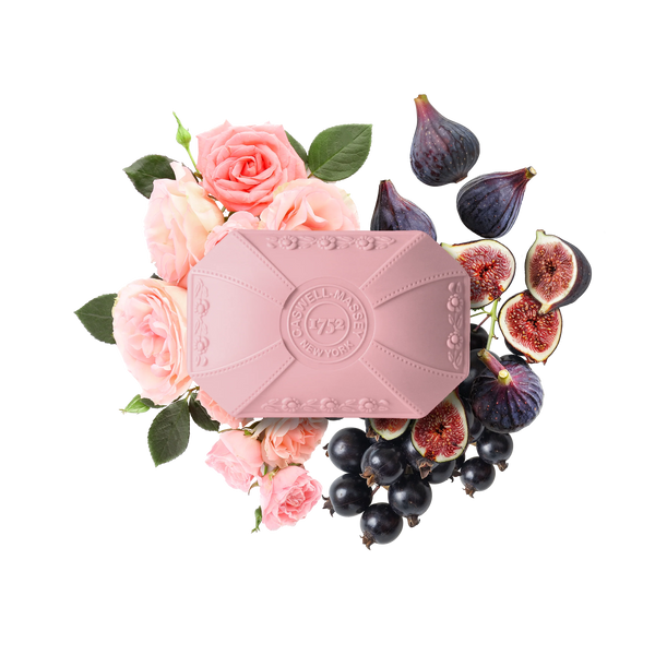The Caswell-Massey Rose Luxury Bar Soap 100g is embossed and surrounded by pink roses, figs, and blackcurrants on a white background.