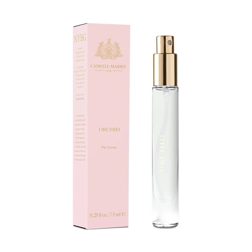 A 7.5ml Caswell-Massey Orchid Perfume in a clear glass spray bottle with a gold cap is paired with a pink and gold box, both displaying elegant branding that reflects this classic floral fragrance.