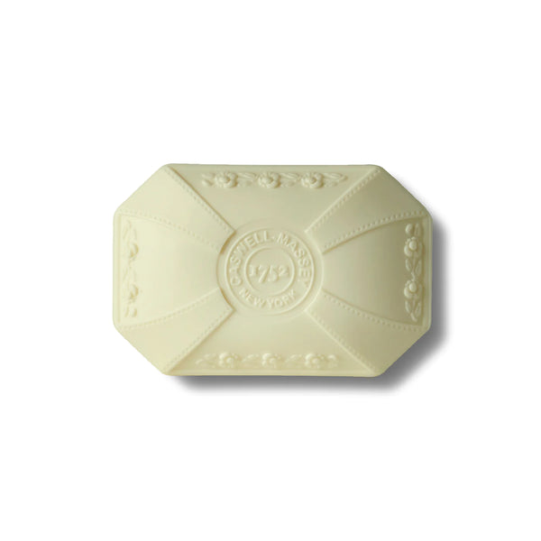 The Caswell-Massey Peony Luxury Bar Soap 100gm is a rectangular, cream-colored triple-milled bar embossed with decorative patterns and "CASWELL-MASSEY 1752 NEW YORK," offering an elegant bathing experience.