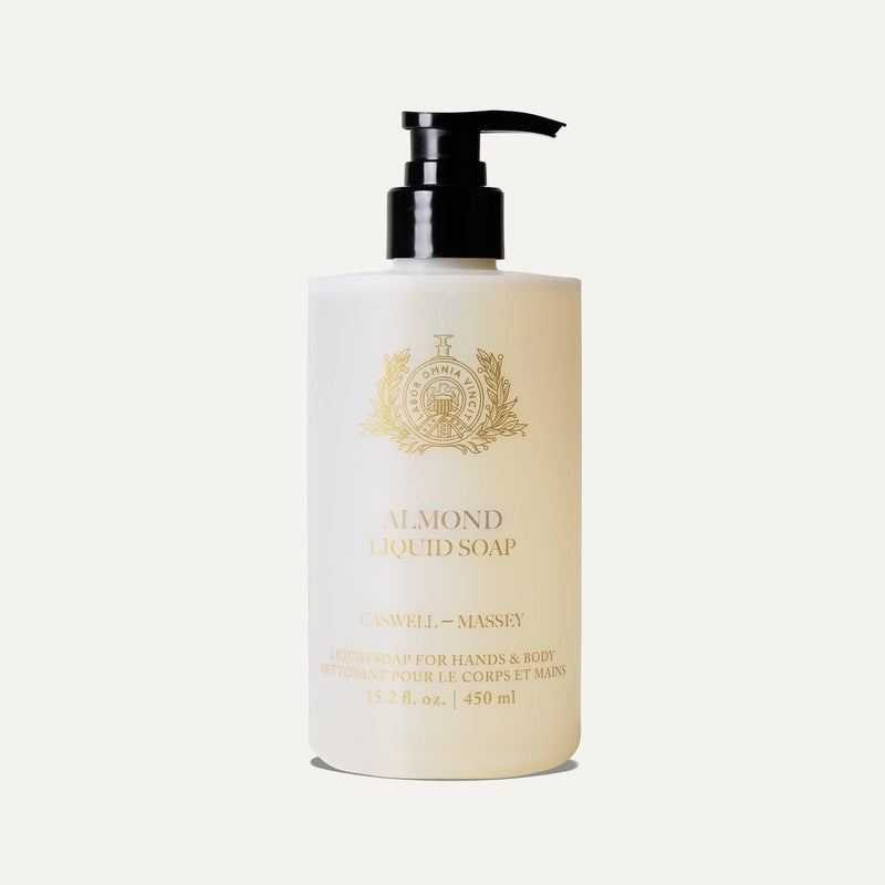 A 15.2 fl. oz. clear bottle of Caswell-Massey Almond & Aloe Hand & Body Wash with a black pump and gold label, featuring plant-based formula for hands and body.