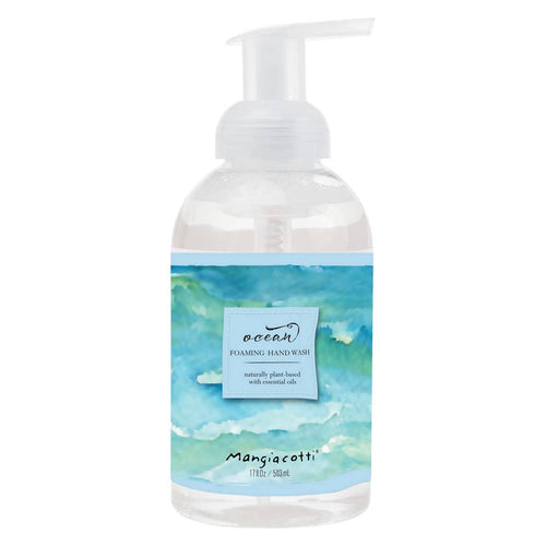 A clear bottle of Mangiacotti Ocean Foaming Hand Wash features a pump dispenser and a blue ocean-themed label, highlighting its "naturally plant-based ingredients with essential oils.