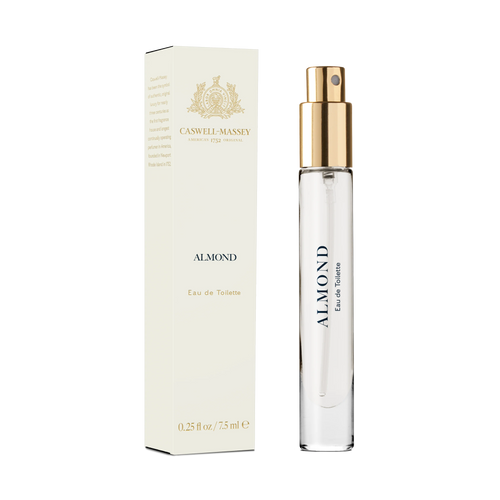 The Caswell Massey Almond Eau de Toilette (7.5 ml) comes in a clear glass bottle with a gold spray top, labeled and displayed next to its cream-colored, gold-accented box, offering a refined cherry-scented fragrance experience.