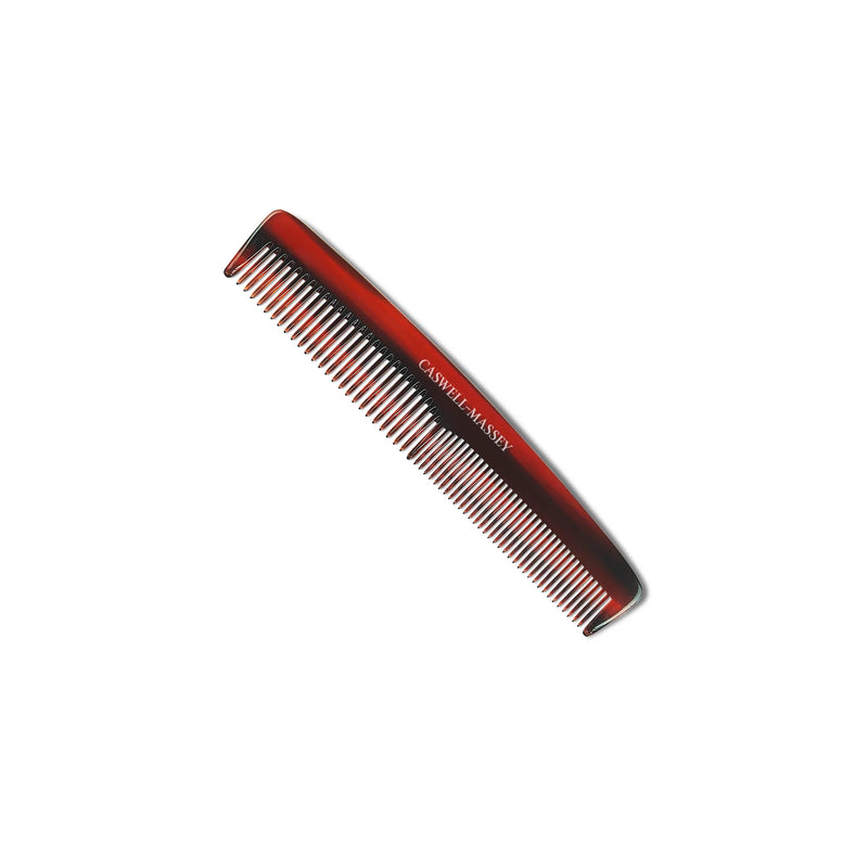A red, dual-sided Caswell Massey Comb - Medium/Fine with closely spaced teeth and the text "carboni master" printed in white on its side, isolated on a white background.