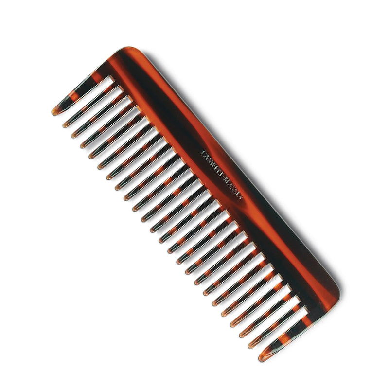 A brown and black Caswell Massey De-Tangler extra-wide-tooth hair comb isolated on a white background.